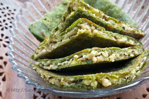 photo of palak paneer paratha (spinach cottage cheese stuffed indian bread)
