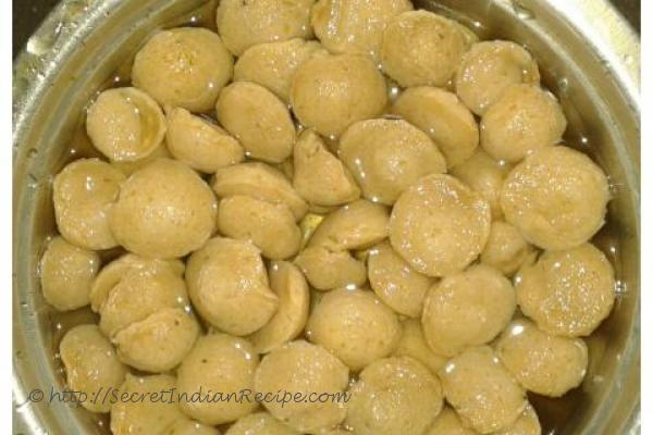 photo of kakrol tarkari (teasle gourd with fish head and soya nuggets )