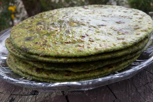 photo of palak paneer paratha (spinach cottage cheese stuffed indian bread)