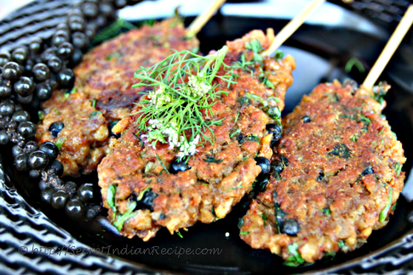 photo of healthy soya seekh kebabs with fresh peppercorns