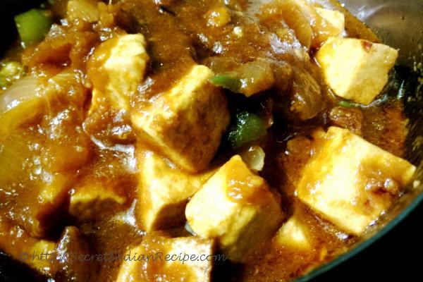 photo of chilli paneer (cottage cheese cooked with soya and chilli sauce)