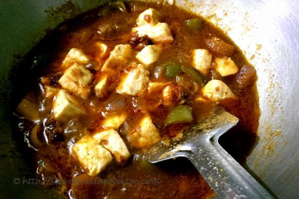 photo of chilli paneer (cottage cheese cooked with soya and chilli sauce)