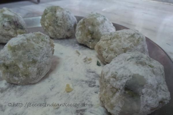 photo of kacche papite ka kofta (raw papaya dumplings in gravy)