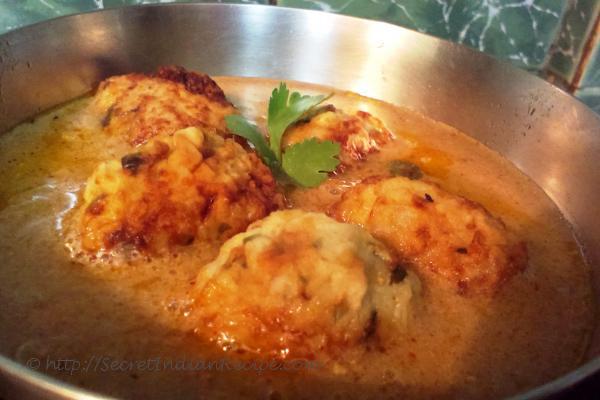 photo of kacche papite ka kofta (raw papaya dumplings in gravy)