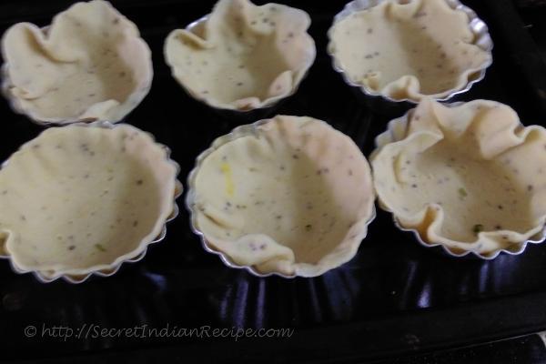photo of baked tacos with veggi topping