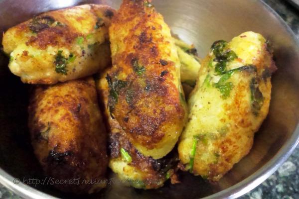 photo of malai kofta is white gravy (cottage cheese and potato dumplings in cashew gravy)