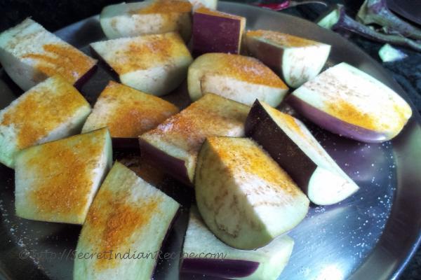 photo of begun baahari (egg plant cooked in mustard and poppy seed gravy)
