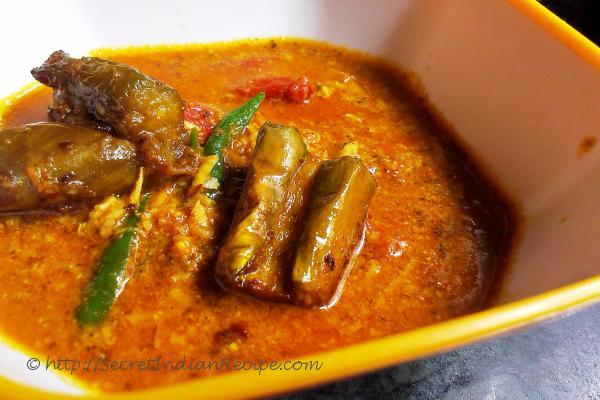 photo of begun baahari (egg plant cooked in mustard and poppy seed gravy)