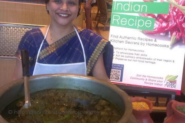 photo of noroxinho aru boror anja (lentil dumplings in curry leaves curry)