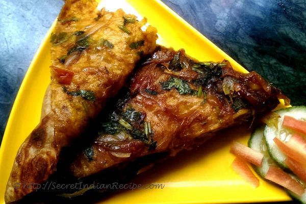 photo of pyazi masala paratha (onion stuffed flat bread)