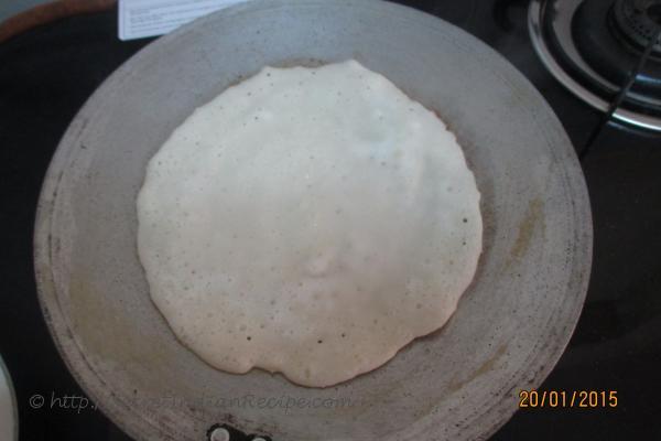 photo of chakuli pitha ( white lentil and rice pancake )