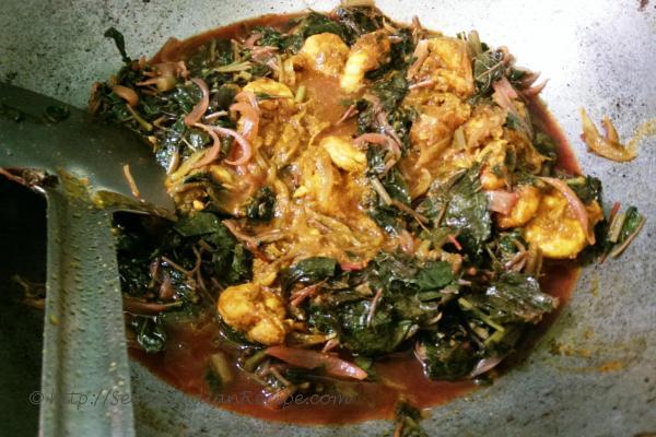 photo of saag chingri (prawns cooked with red spinach)