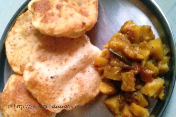 Picture of: Poori aur Panch phoran Aloo Bhaji