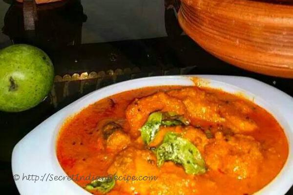 photo of kingfish and green mango in a coconut gravy