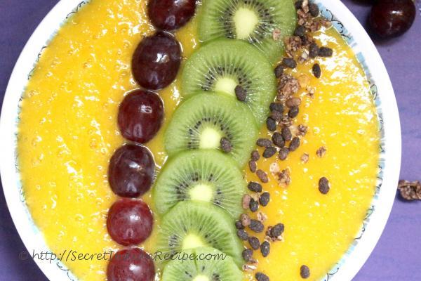 photo of mango smoothie breakfast bowl