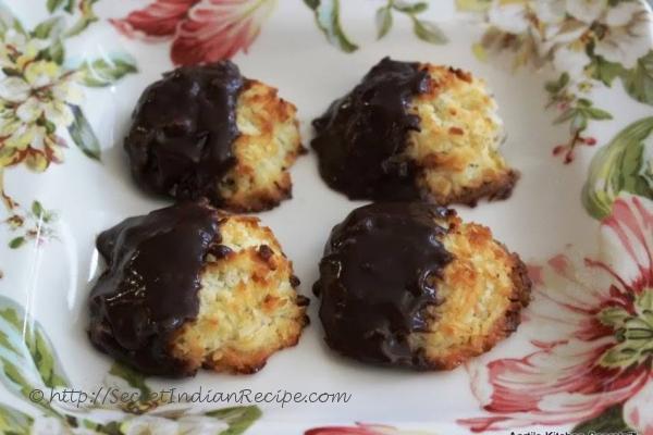 photo of chocolate dipped eggless coconut macaroons with cardamom flavour