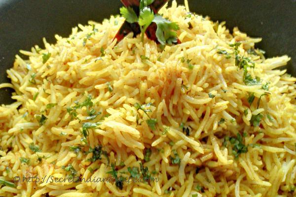 photo of puliyogare (tarmarind rice)