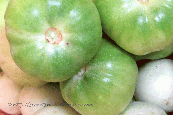 photo of pachthakali thoran (green tomato stir fry)